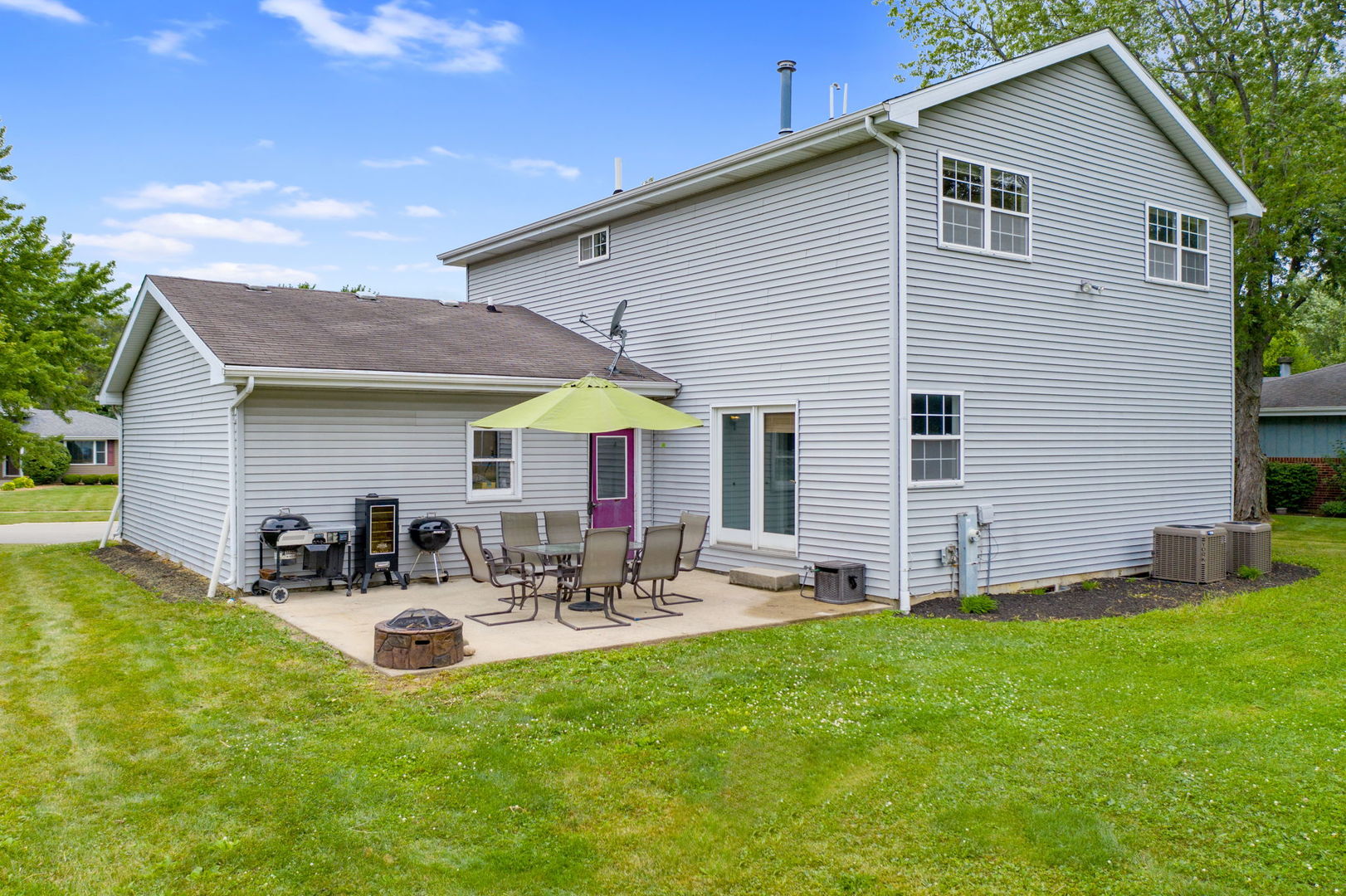 600 Stonegate Road New Lenox, IL 60451 - Photo 22 of 23 a front view of house with yard and outdoor seating