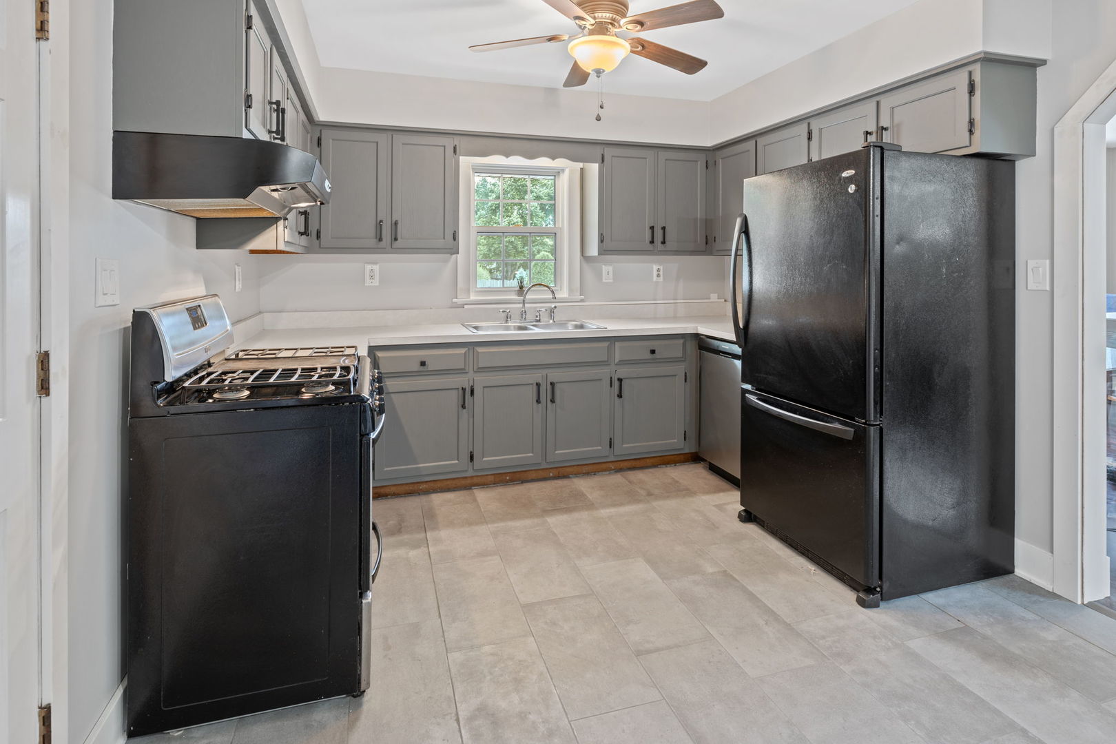600 Stonegate Road New Lenox, IL 60451 - Photo 5 of 23 a kitchen with a refrigerator sink and stove