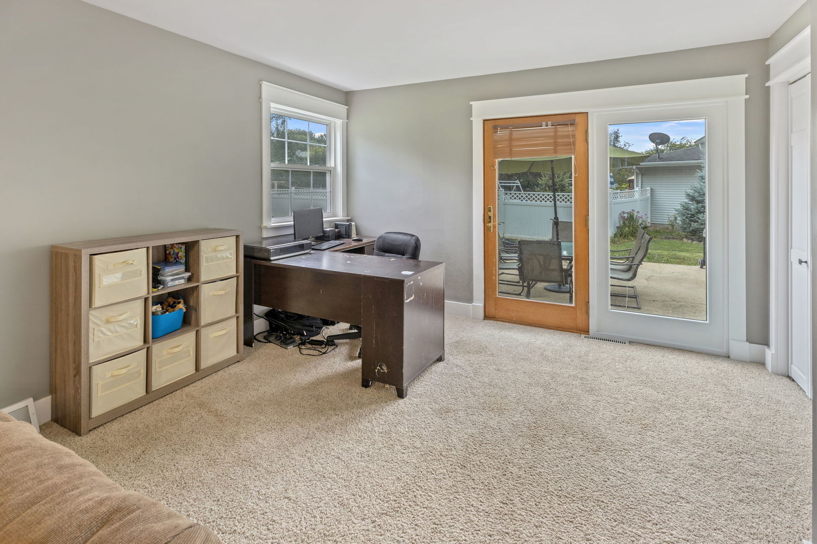 600 Stonegate Road New Lenox, IL 60451 - Photo 9 of 23 a view of a workspace with furniture and a window