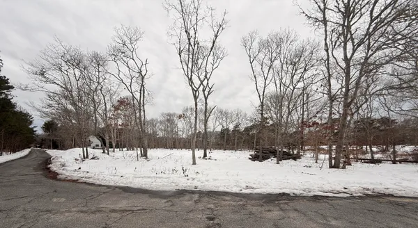 a view of snow on the road
