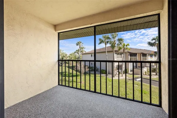 a view of a glass door with a balcony