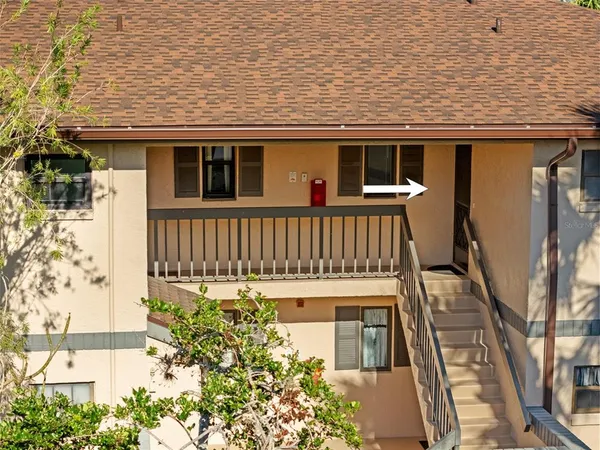 a view of a house with a deck