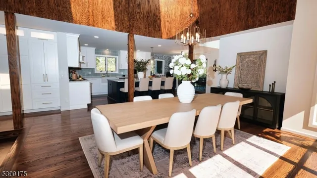 a dining room with furniture and wooden floor