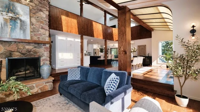 a outdoor living space with furniture and a fireplace