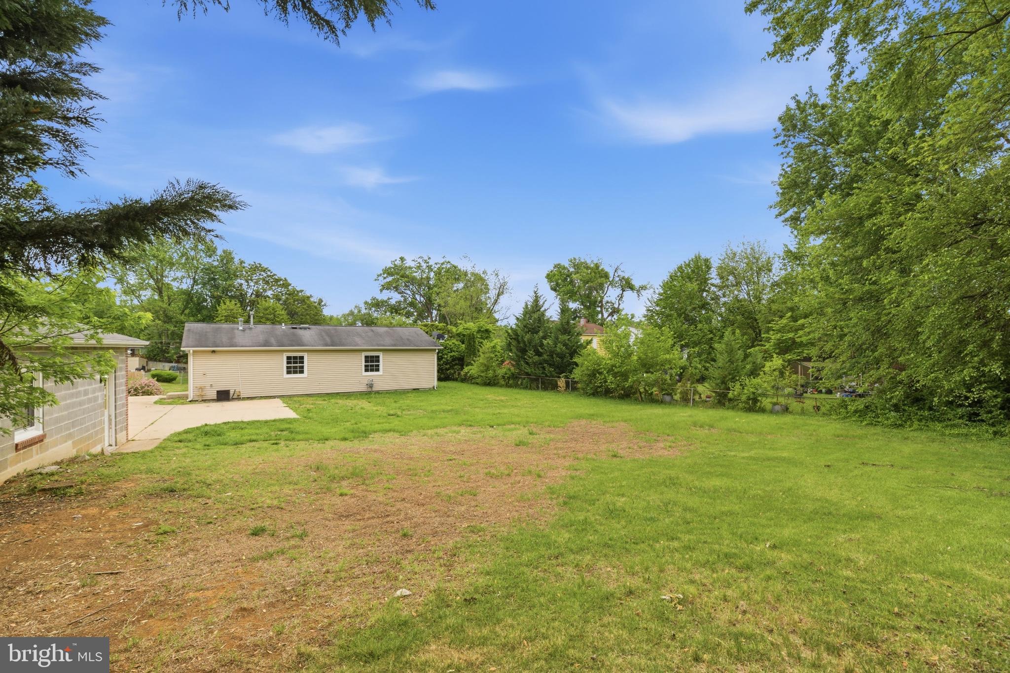 14033 Grayson Road Woodbridge, VA 22191 - Photo 27 of 33 a house view with a garden space