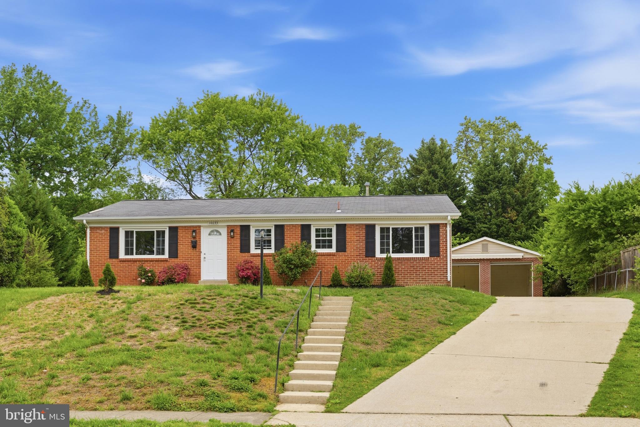 14033 Grayson Road Woodbridge, VA 22191 - Photo 29 of 33 a front view of house with yard and green space