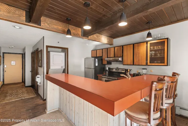 a view of a dining room with furniture