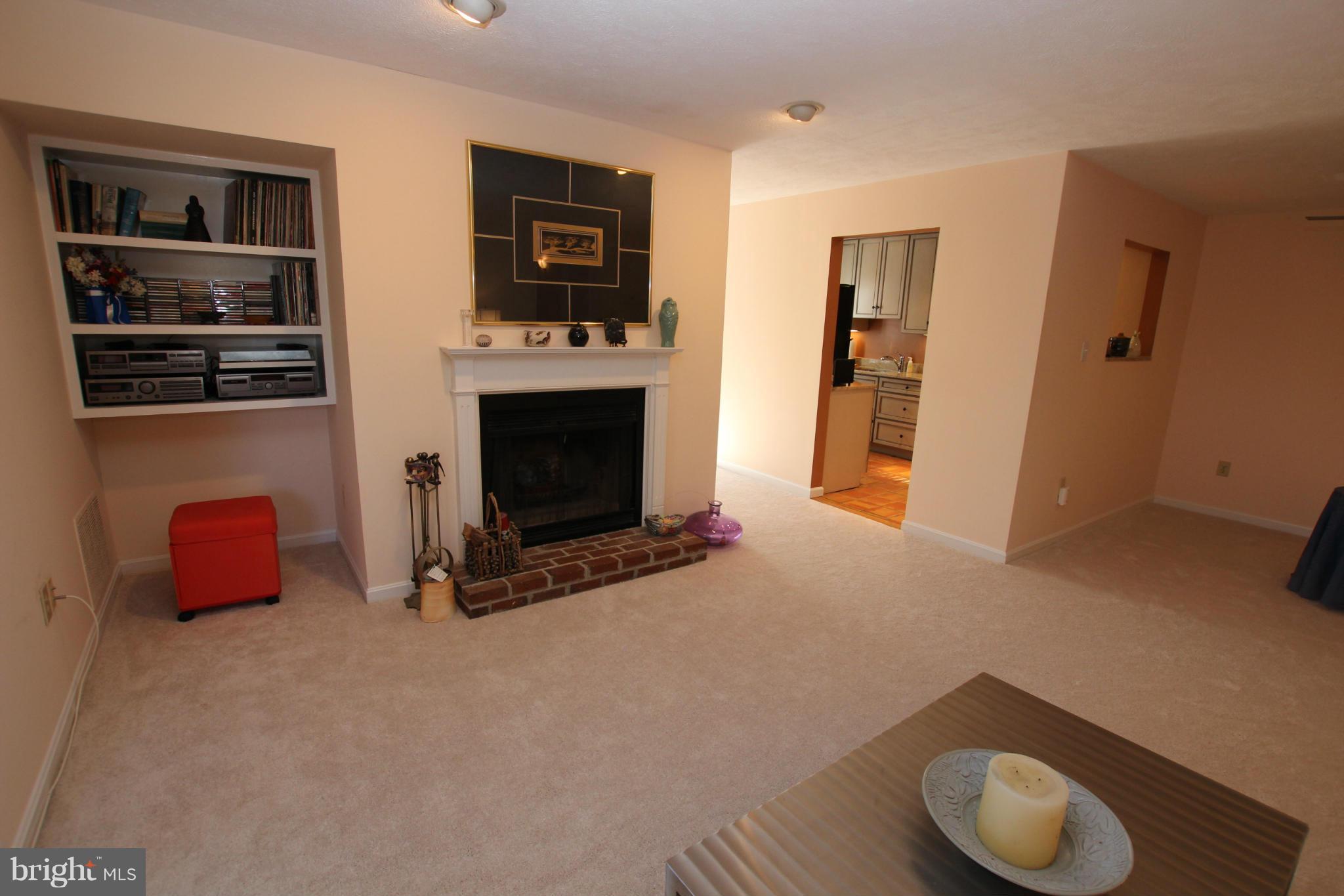 10174 Oakton Terrace Road, Unit 10174 Oakton, VA 22124 - Photo 13 of 30 Living Room built in shelving