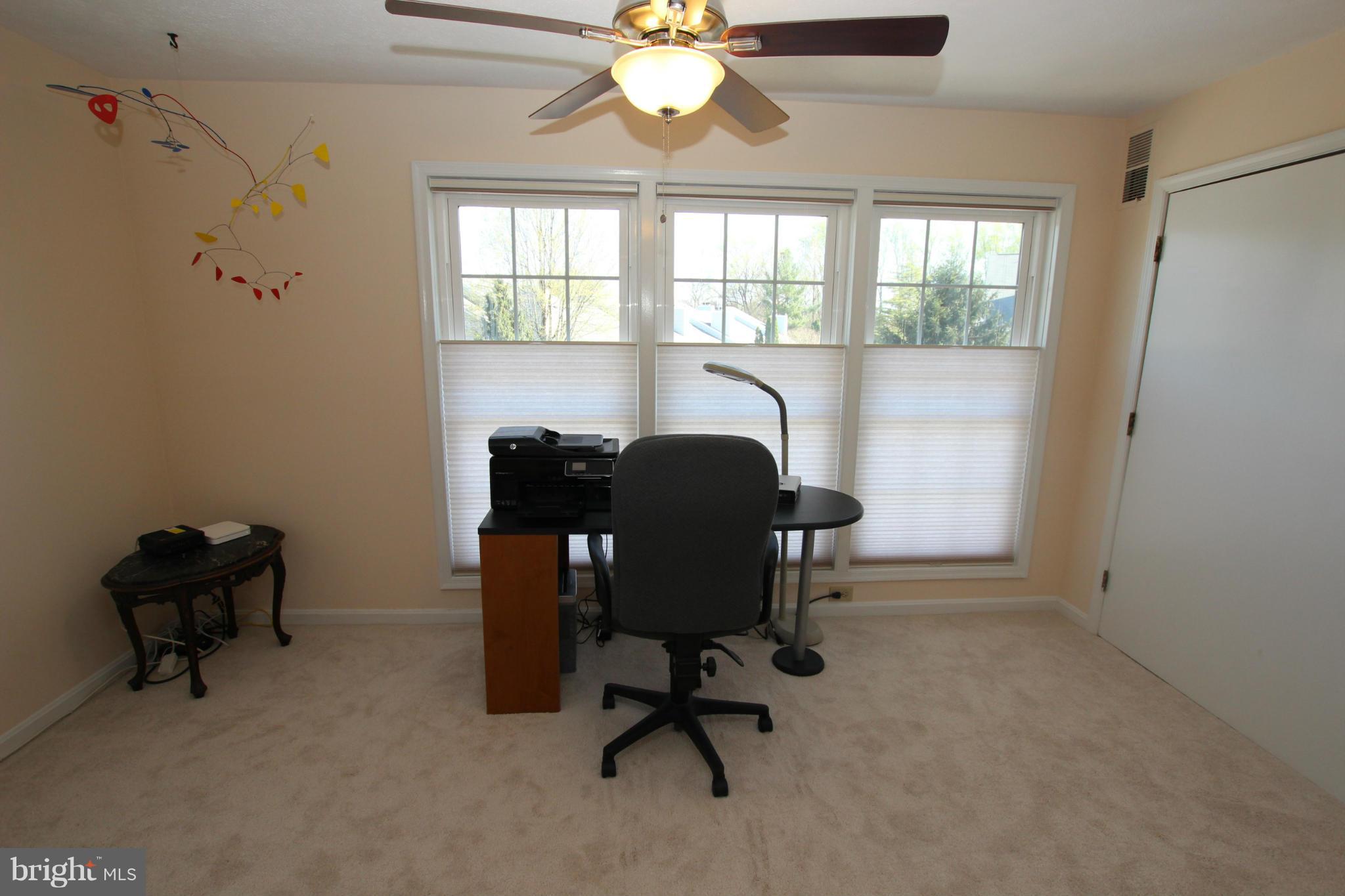 10174 Oakton Terrace Road, Unit 10174 Oakton, VA 22124 - Photo 14 of 30 Bright Sunroom with Fan