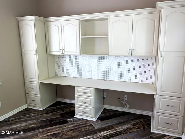 a room with storage and utility