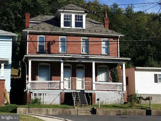 a view of a building with a window and balcony