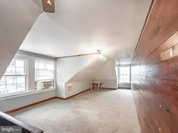 a view of a livingroom with a staircase