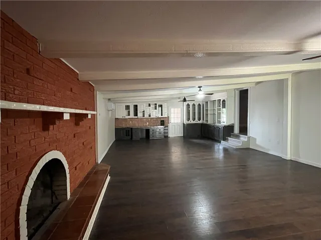 a view of livingroom with furniture and fireplace