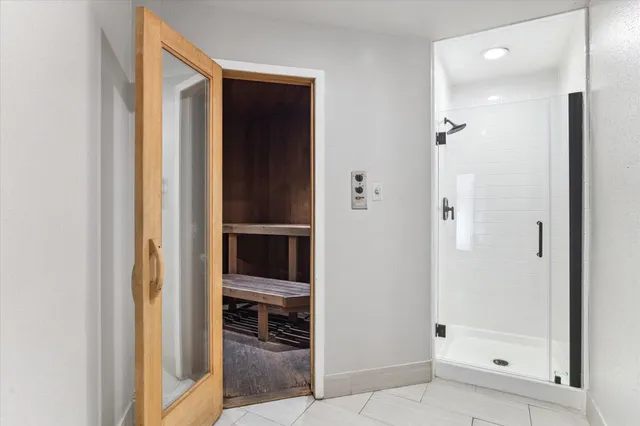 a front view of a building with barbeque and outdoor seating