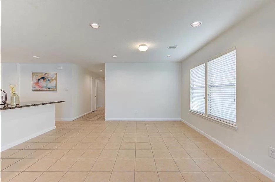 15331 Keystone Bend Lane Cypress, TX 77429 - Photo 11 of 18 a view of an empty room with a window