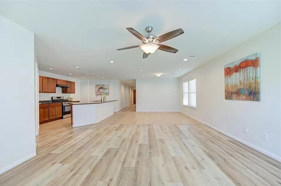 15331 Keystone Bend Lane Cypress, TX 77429 - Photo 14 of 18 a view of kitchen with cabinets and wooden floor