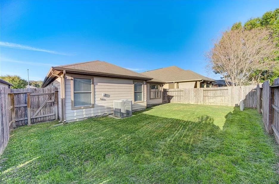 15331 Keystone Bend Lane Cypress, TX 77429 - Photo 18 of 18 a front view of a house with garden
