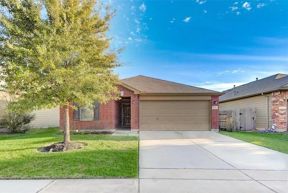 15331 Keystone Bend Lane Cypress, TX 77429 - Photo 2 of 18 a front view of house with yard