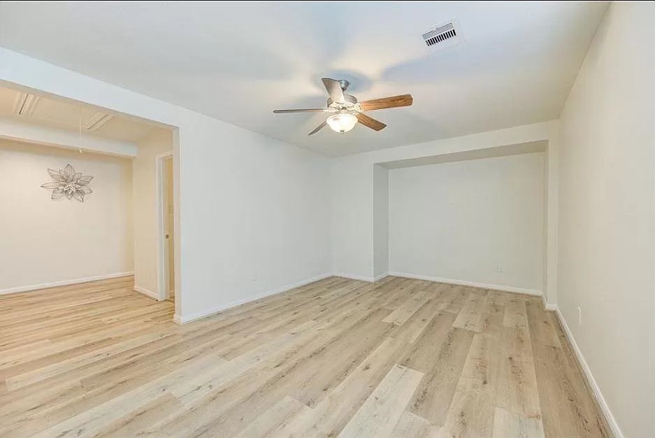 15331 Keystone Bend Lane Cypress, TX 77429 - Photo 9 of 18 a view of empty room with wooden floor