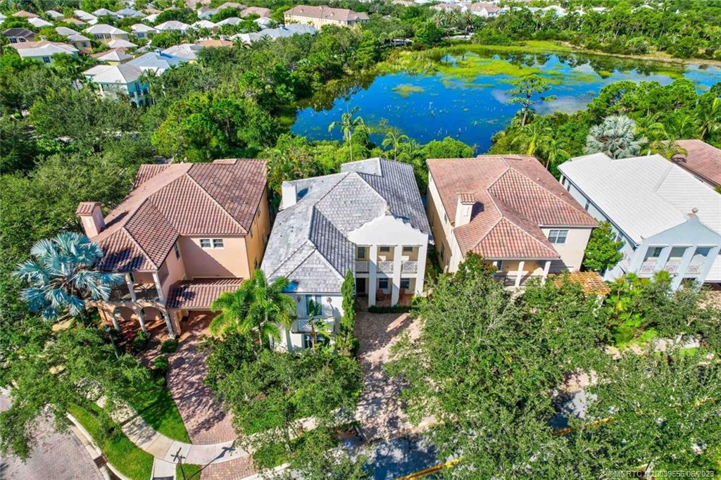 108 Tulip Tree Court Jupiter, FL 33458 - Photo 13 of 41 an aerial view of a house with garden space and outdoor space
