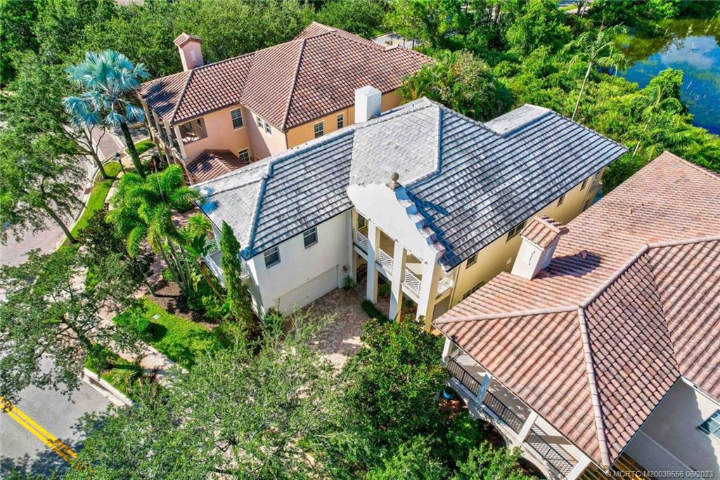 108 Tulip Tree Court Jupiter, FL 33458 - Photo 14 of 41 an aerial view of a house with balcony and trees
