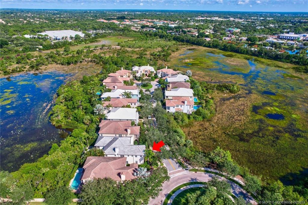 108 Tulip Tree Court Jupiter, FL 33458 - Photo 25 of 41 an aerial view of residential houses with outdoor space and river