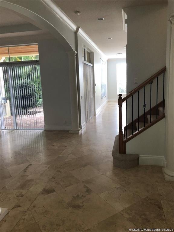 108 Tulip Tree Court Jupiter, FL 33458 - Photo 27 of 41 a view of entryway with wooden floor