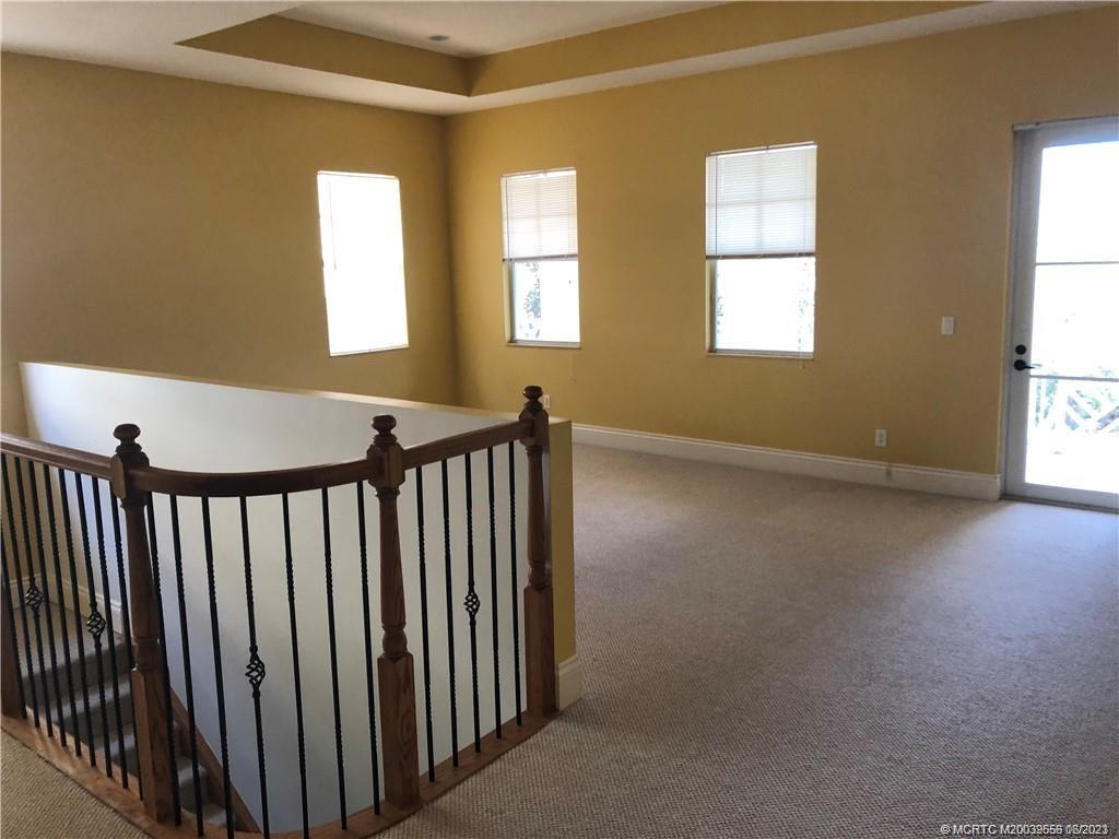 108 Tulip Tree Court Jupiter, FL 33458 - Photo 34 of 41 a view of hallway with windows