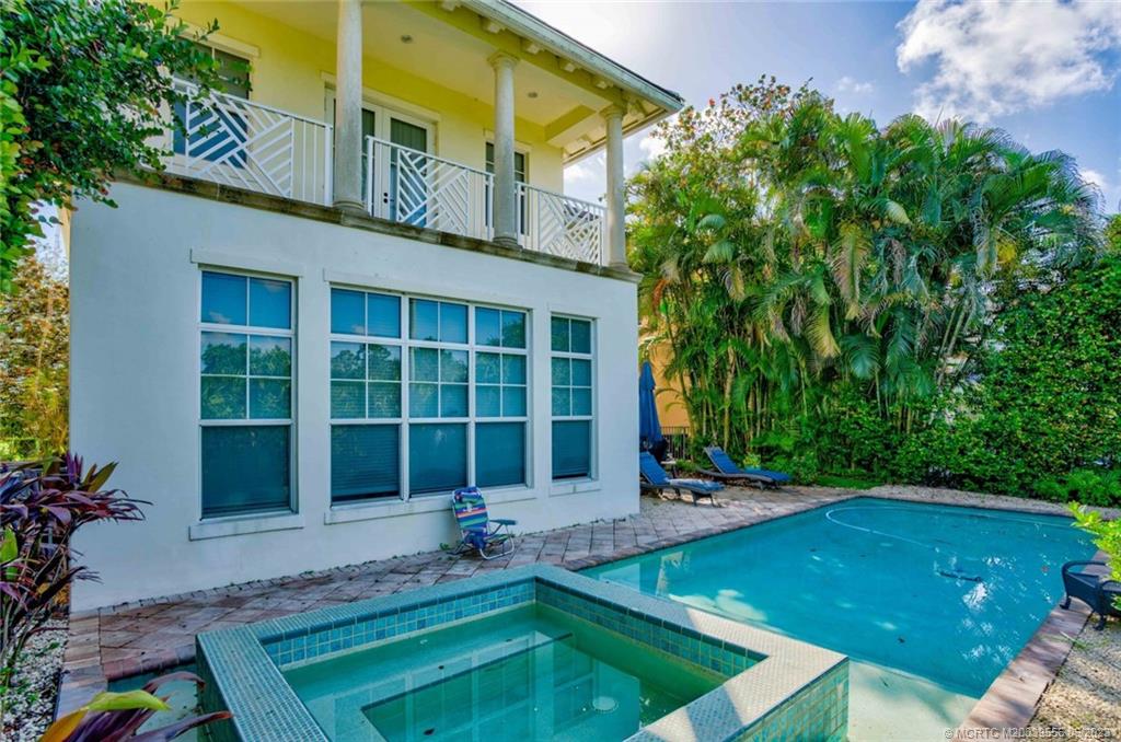 108 Tulip Tree Court Jupiter, FL 33458 - Photo 8 of 41 a front view of a house with a yard