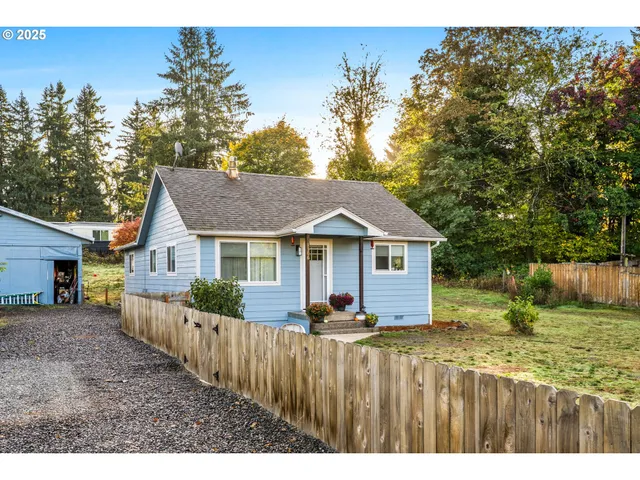 a view of a house with a big yard
