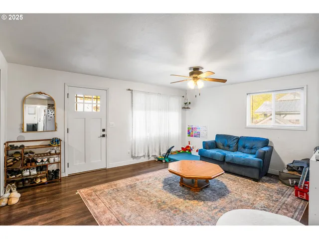 a picture of a bench in front of a wall