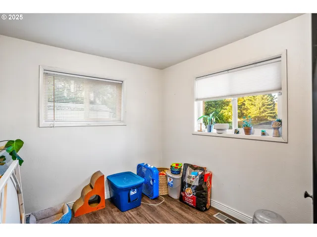 a room with furniture and a window