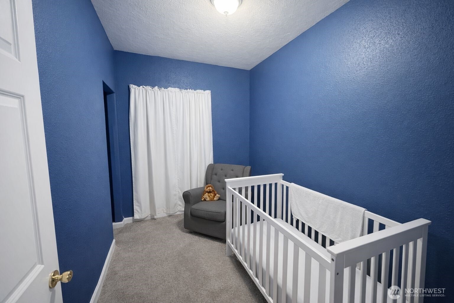 302 Centre Street North Rainier, WA 98576 - Photo 14 of 28 a view of a bedroom with wooden floor
