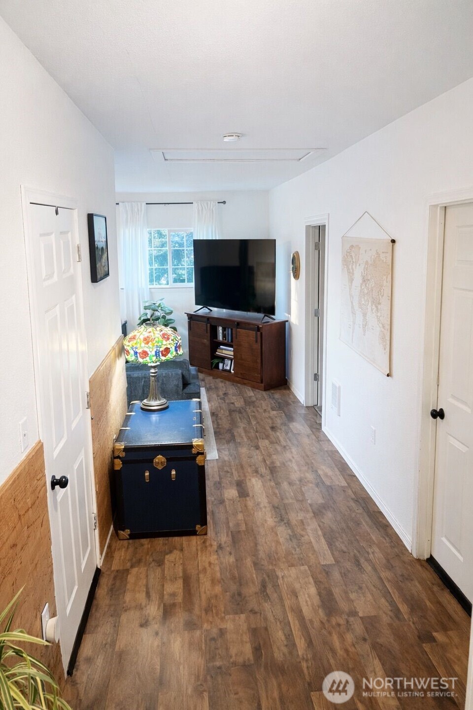 302 Centre Street North Rainier, WA 98576 - Photo 17 of 28 a living room with furniture and a flat screen tv