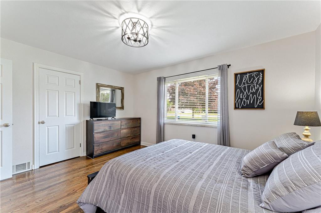9475 Peebles Road Allison Park, PA 15101 - Photo 25 of 34 a bedroom with a bed and a television