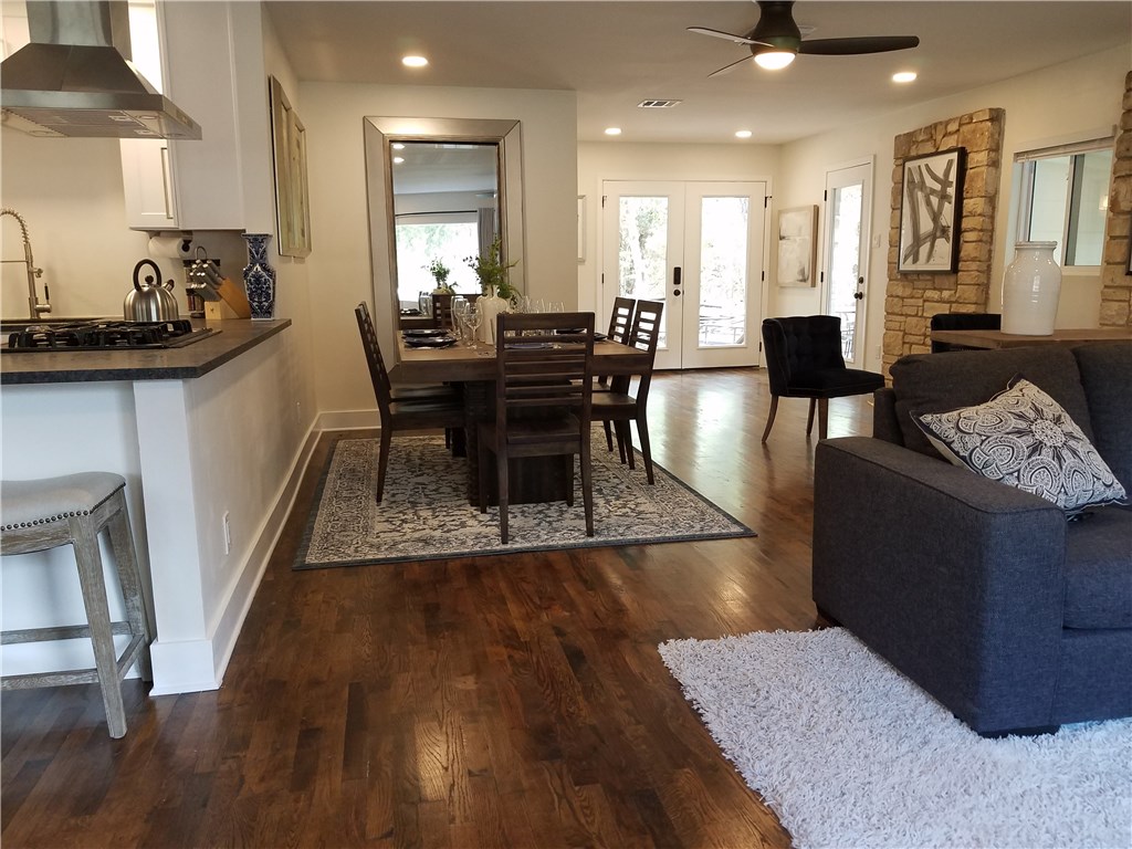 5405 Hudson Street Austin, TX 78721 - Photo 36 of 37 An open floorplan seamlessly connects the kitchen, dining area, and living room.