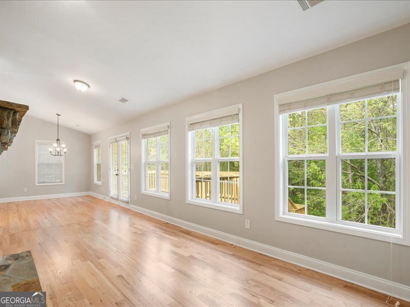 1406 Morgans Bluff Monroe, GA 30656 - Photo 21 of 80 a view of an empty room with a window