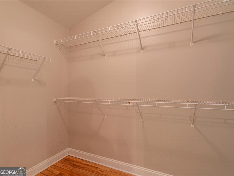 1406 Morgans Bluff Monroe, GA 30656 - Photo 25 of 80 a view of a room with racks on the wall