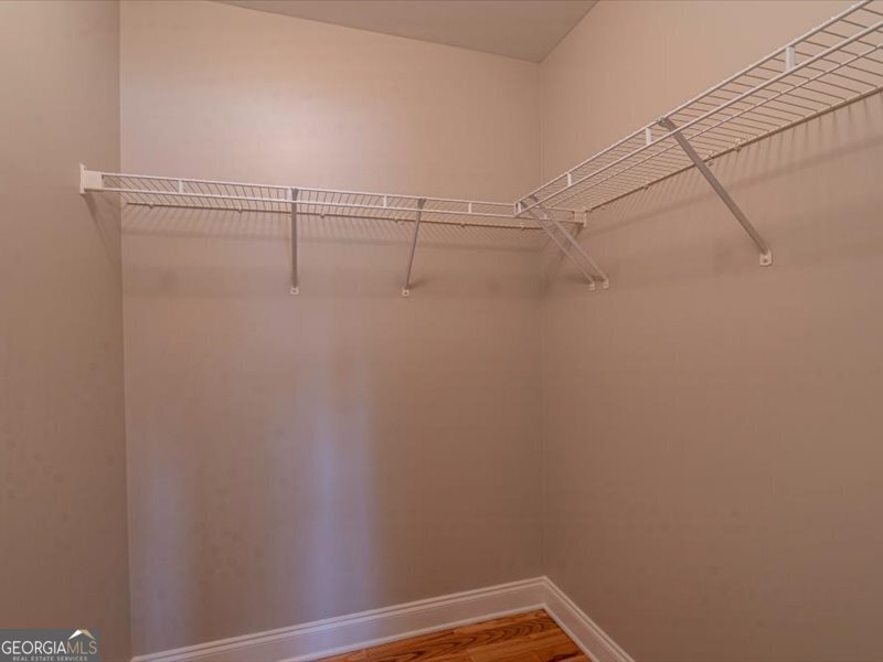 1406 Morgans Bluff Monroe, GA 30656 - Photo 38 of 80 a view of a room with racks on the wall