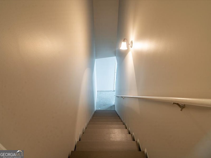 1406 Morgans Bluff Monroe, GA 30656 - Photo 40 of 80 a view of a hallway with wooden floor