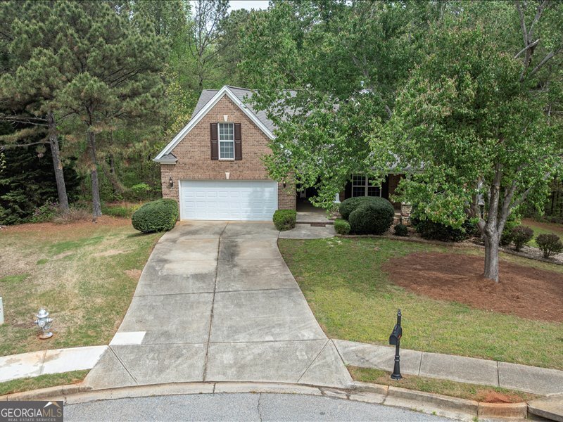 1406 Morgans Bluff Monroe, GA 30656 - Photo 4 of 80 a view of a house with a yard
