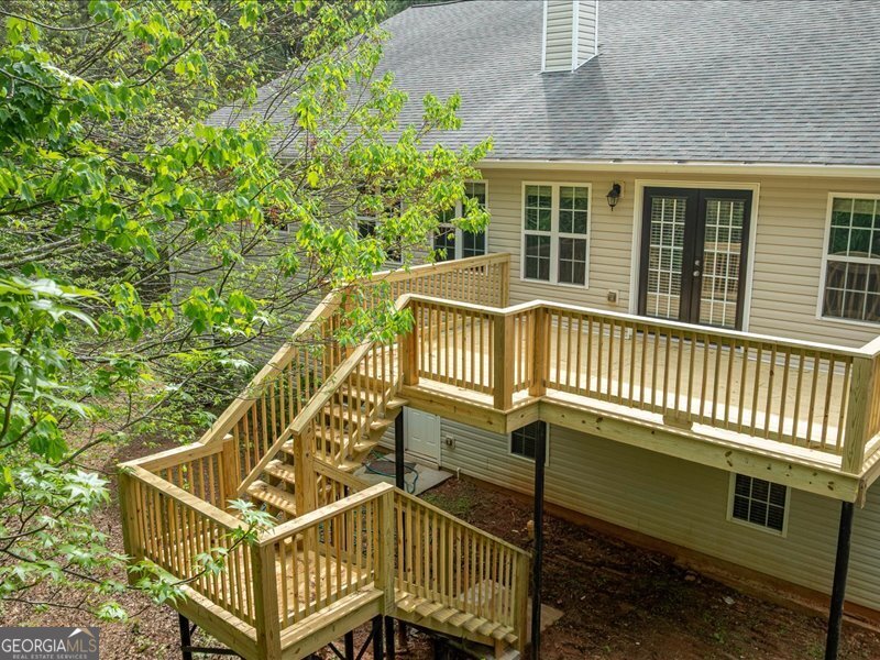 1406 Morgans Bluff Monroe, GA 30656 - Photo 55 of 80 a view of a house with a deck