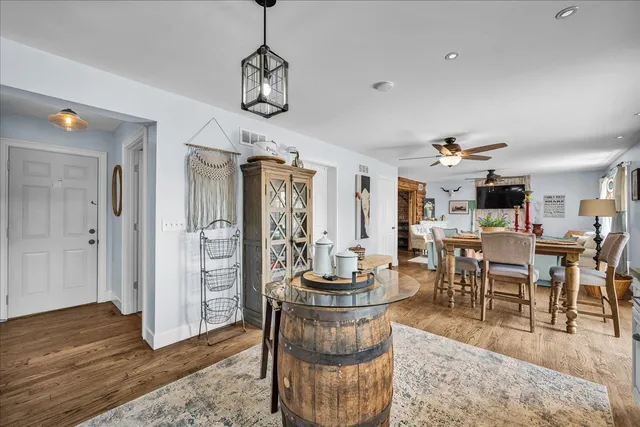 a bathroom with a sink mirror and vanity