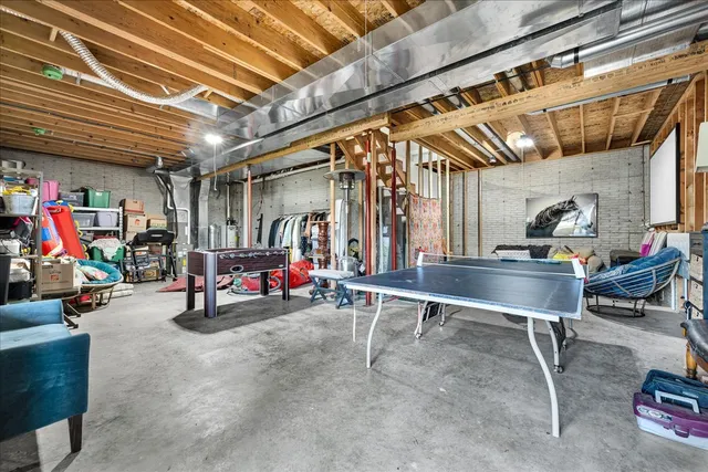 a backyard of a house with a garden and plants