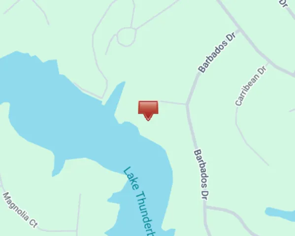 a view of a house with pool and chairs