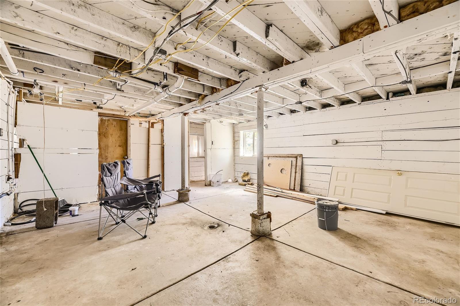 539 Neal Road Bailey, CO 80421 - Photo 12 of 26 a view of a room with gym equipment