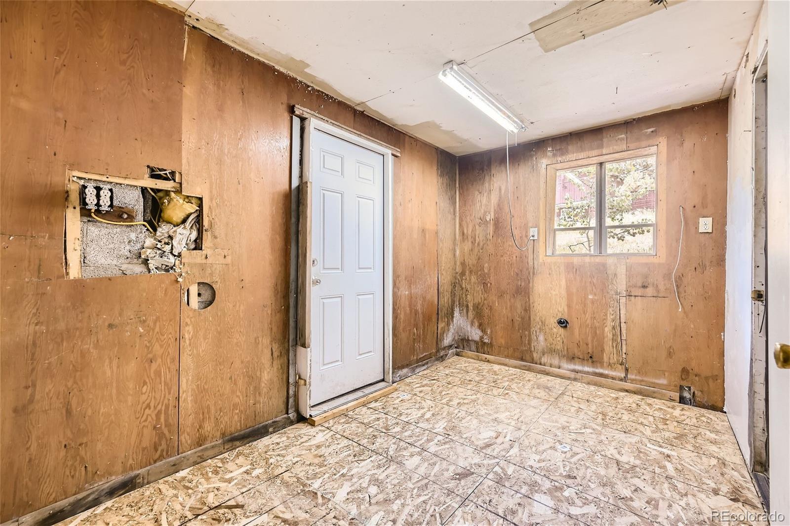 539 Neal Road Bailey, CO 80421 - Photo 16 of 26 a view of a bathroom with a shower