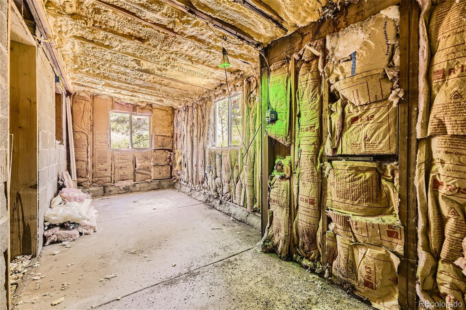 539 Neal Road Bailey, CO 80421 - Photo 20 of 26 a view of a bathroom with a shower and a sink