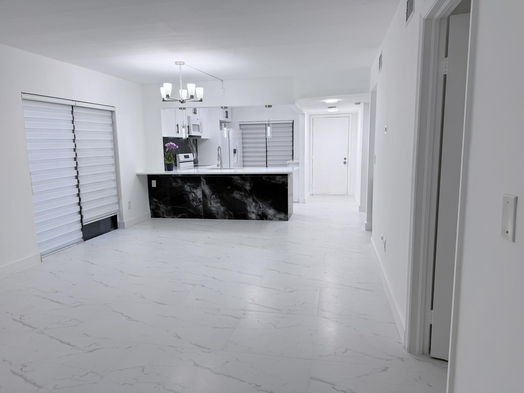 300 East Club Circle, Unit 107 Boca Raton, FL 33487 - Photo 5 of 16 Living and dining room