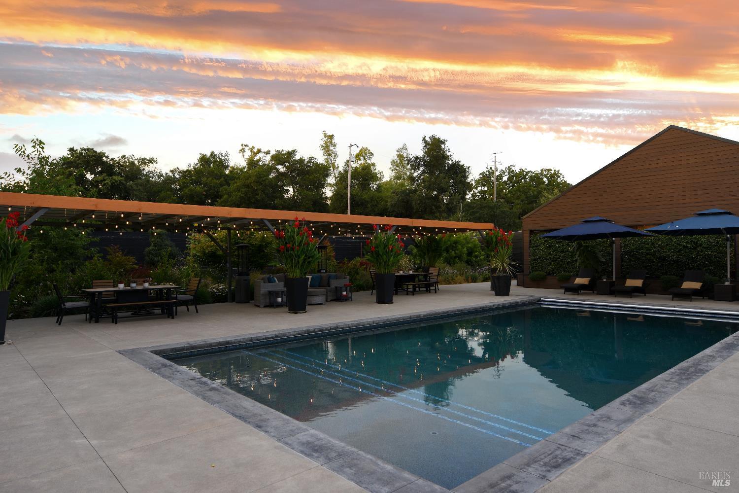 85 Trinity Road Glen Ellen, CA 95442 - Photo 54 of 62 a view of swimming pool with lawn chairs and a table